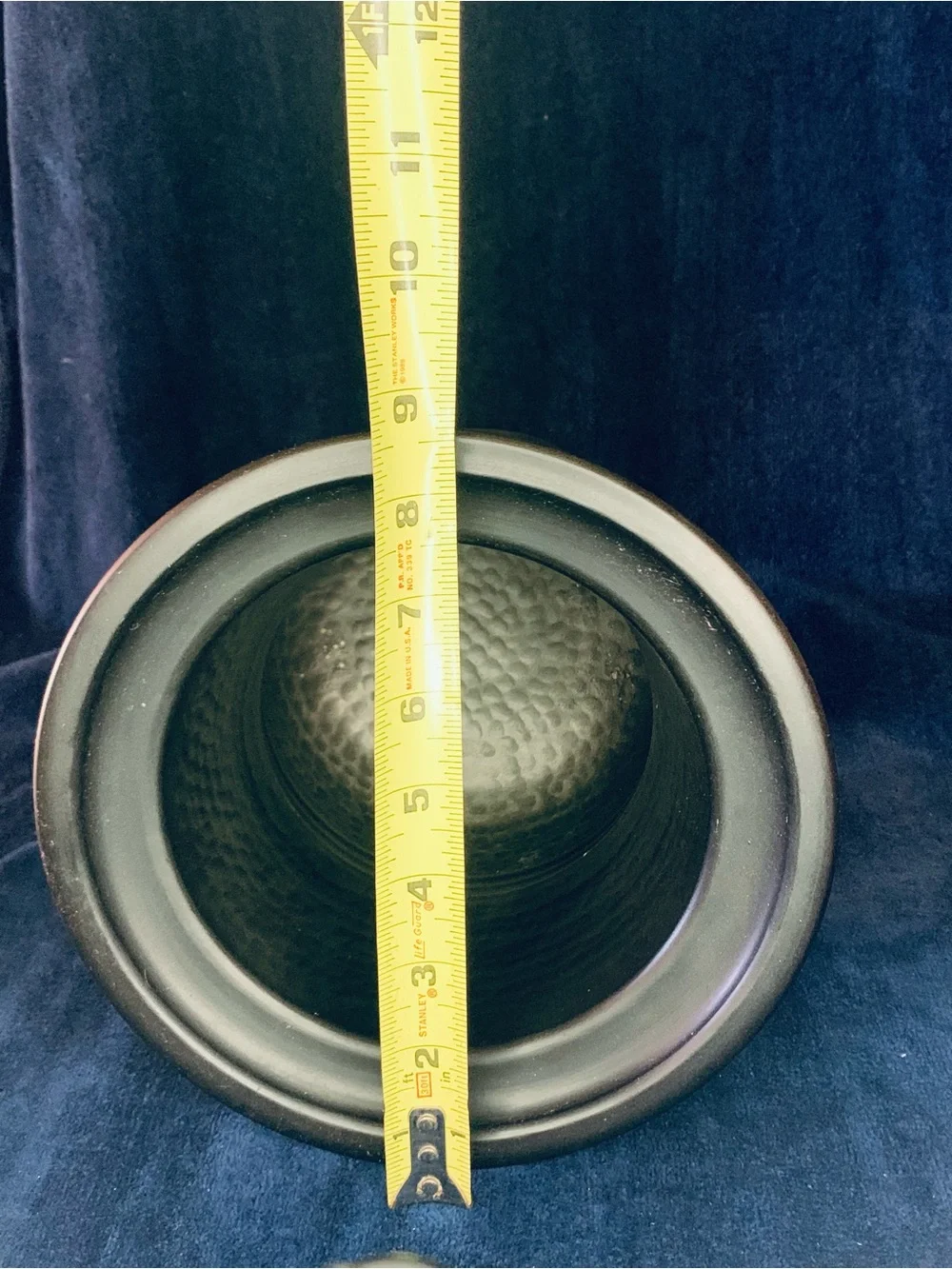 Decorative Urn Vase With a hammered interior design.
